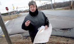 Marilyn Sheldon Pickets Outside the court